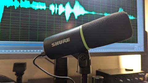 Shure MV6 microphone in front of a computer screen