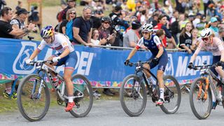 Evie Richards, Pauline Ferrand-Prévot and Puck Pieterse heading into the final lap at the 2023 UCI XCC World Champs
