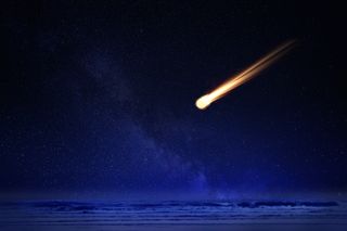 a fireball streaking over water