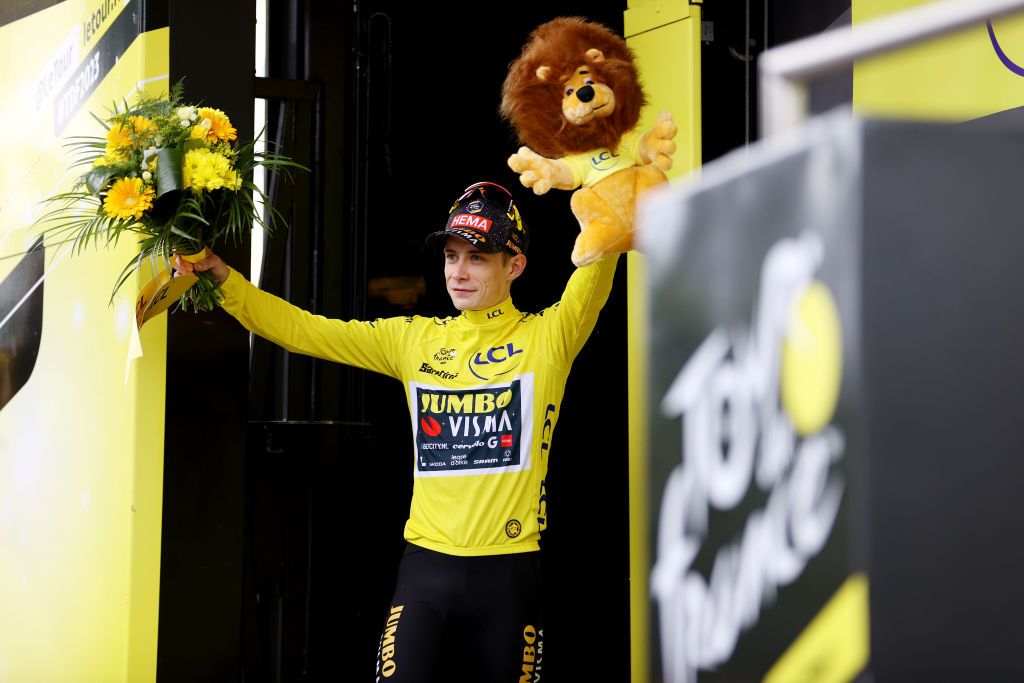 MOULINS FRANCE JULY 12 Jonas Vingegaard of Denmark and Team JumboVisma Yellow Leader Jersey celebrates at podium during the stage eleven of the 110th Tour de France 2023 a 1798km from ClermontFerrand to Moulins UCIWT on July 12 2023 in Moulins France Photo by Michael SteeleGetty Images