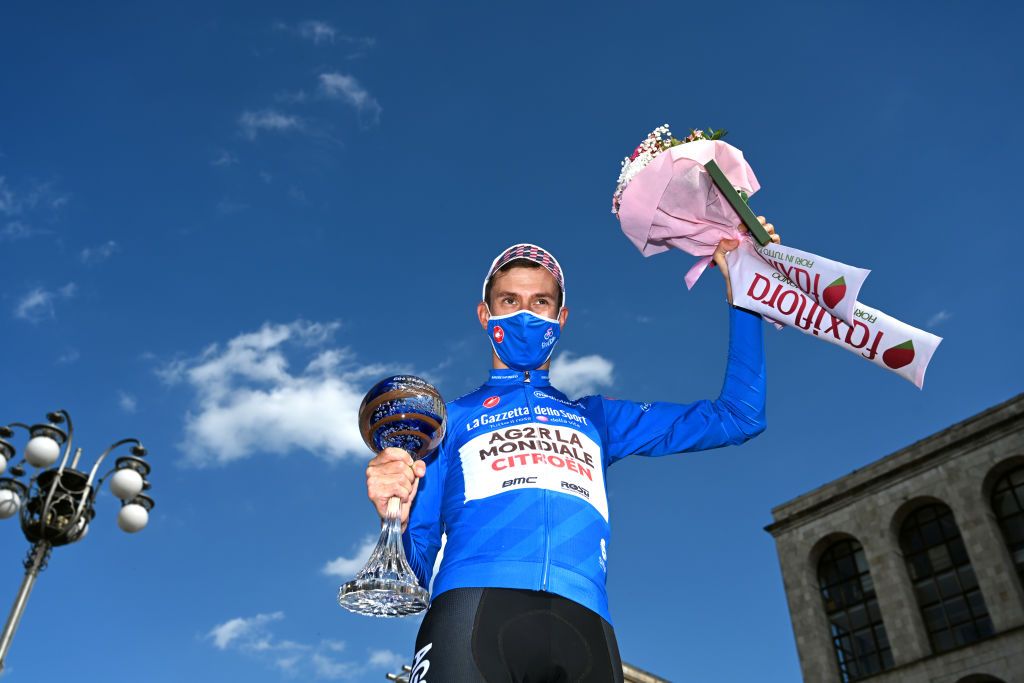 MILAN ITALY MAY 30 Geoffrey Bouchard of France and AG2R Citren Team Blue Mountain Jersey celebrates at podium during the 104th Giro dItalia 2021 Stage 21 a 303km Individual Time Trial stage from Senago to Milano Champagne Trophy ITT UCIworldtour girodiitalia Giro on May 30 2021 in Milan Italy Photo by Stuart FranklinGetty Images