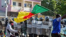Protesters clash with police in Garoua, Cameroon, following the presidential election.