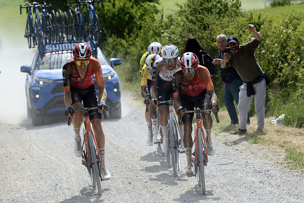 Ineos Grenadiers' Dutch rider Thymen Arensman (L) and Ineos Grenadiers' Brandon Rivera ride in a breakaway on a gravel section during the 9th stage of the 108th Giro d'Italia cycling race in San Martino in Grania near Siena, on May 18, 2025. (Photo by Luca Bettini / POOL / AFP)