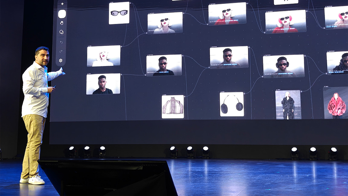 Freepik Spaces; a man gestures at a video wall of images