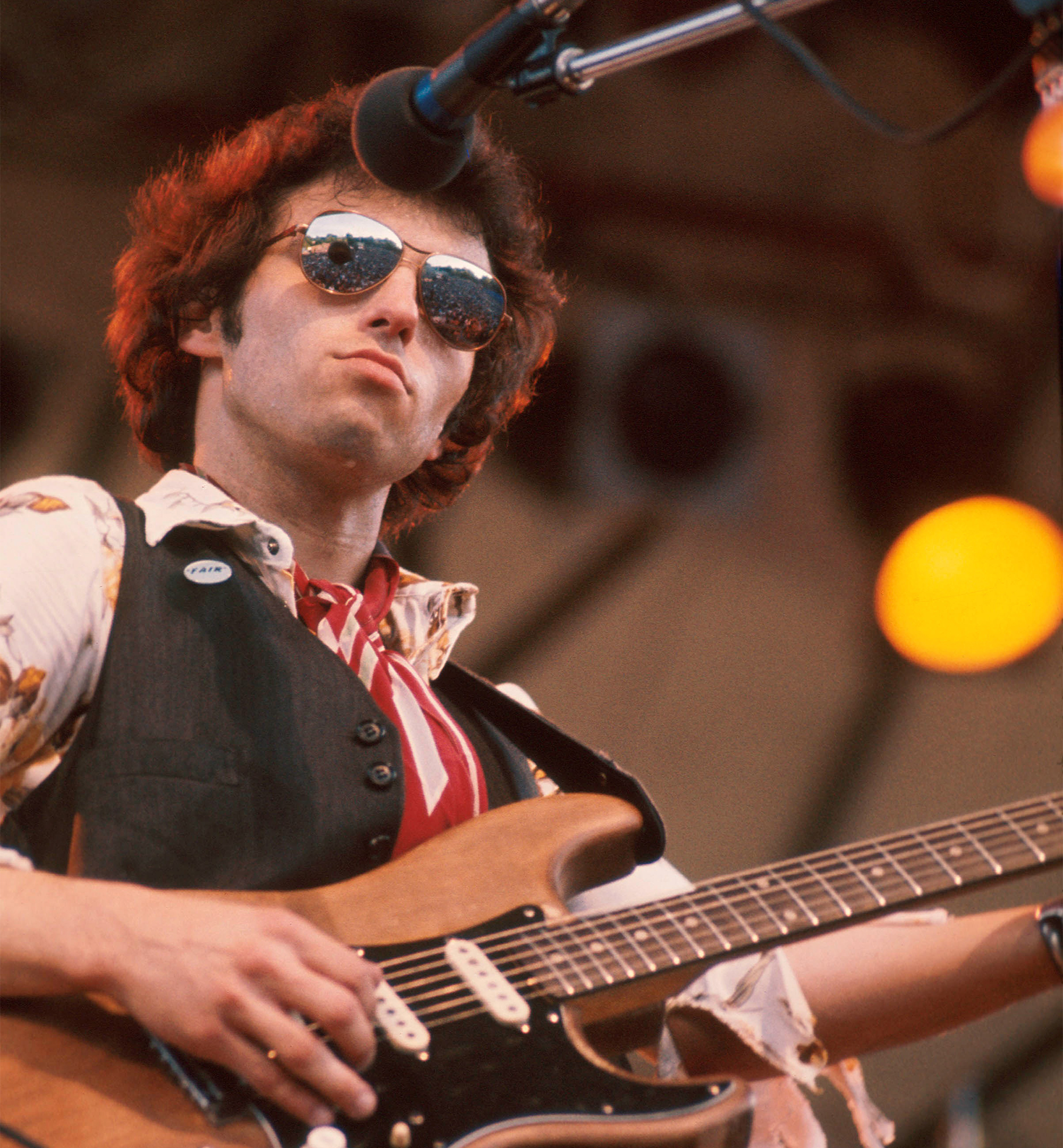 American rock musician Nils Lofgren performing, USA, 30th July 1976.