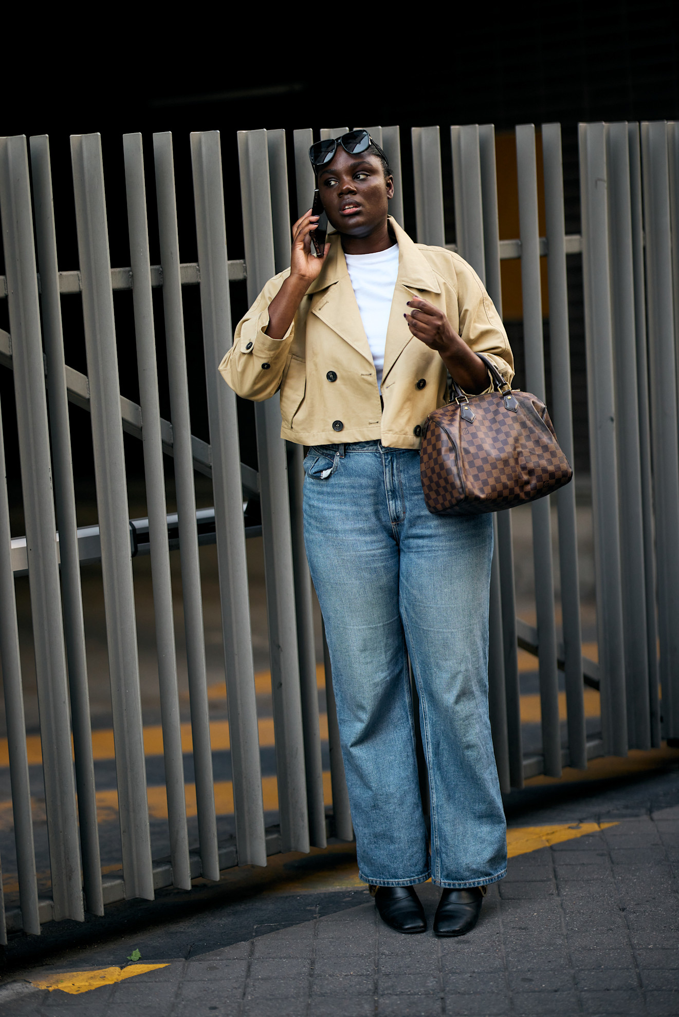showgoer wearing French girl denim at Paris Fashion Week