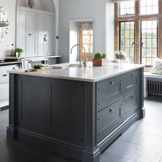 kitchen with grey drawers and cupboard
