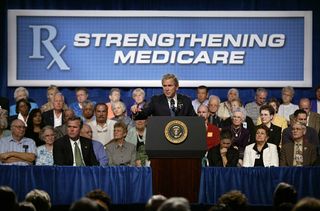 United States President George W. Bush addresses a gathering on senior medicare benefits at the Englewood Neighborhood Center in Orlando. President Bush used Florida, the state with the highest percentage of residents ag