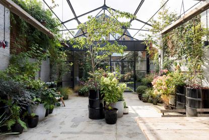 courtyard garden ideas with retractable glass roof
