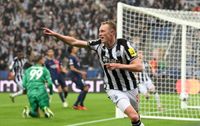 Newcastle player Sean Longstaff celebrates after scoring the third goal during the UEFA Champions League match between Newcastle United FC and Paris Saint-Germain at St. James Park on October 04, 2023 in Newcastle upon Tyne, England. 