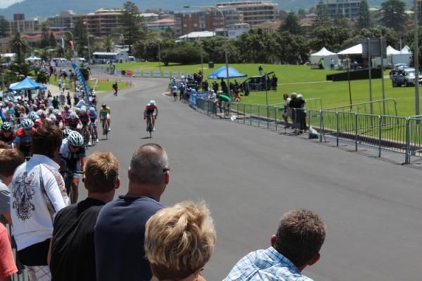 The crowd watches on as the peloton comes by early in the race. It was a picture perfect day in Wollongong, after showers had looked ominous in the morning.