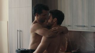 Scott carrying Kip in Heated Rivalry 