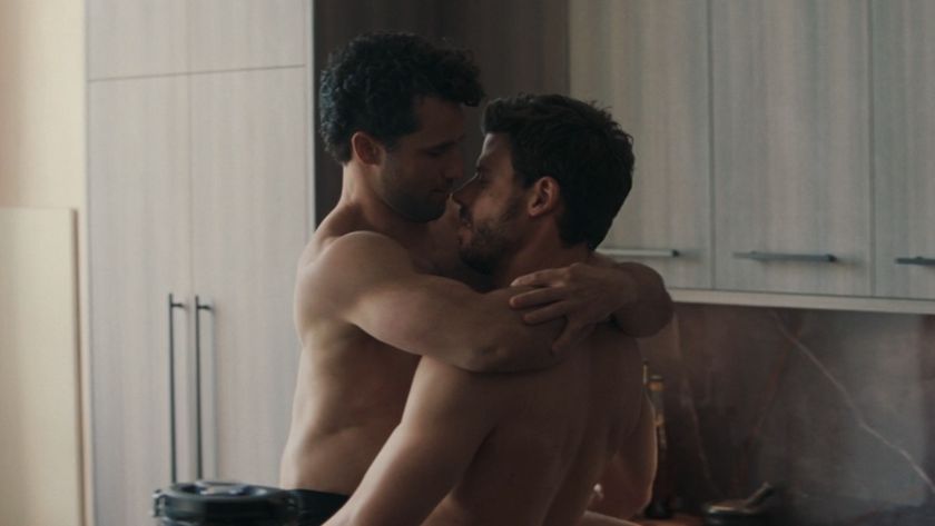 Scott carrying Kip in Heated Rivalry 