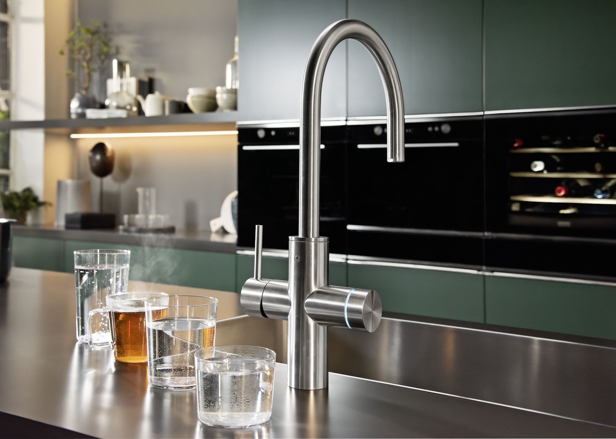 A modern multifunction tap that dispenses boiling water, sparkling, ambient and filtered