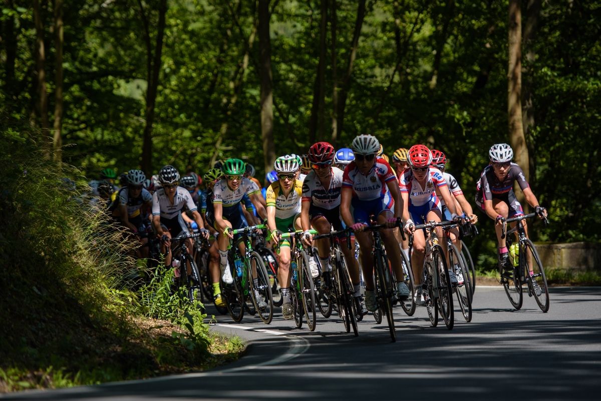 Climbing through the trees, Amanda Spratt catches the light at Th&Atilde;&frac14;ringen Rundfarht