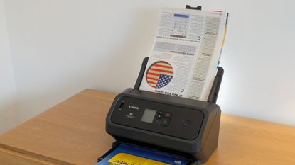 The Canon ImageFormula DR-C350 on a desk