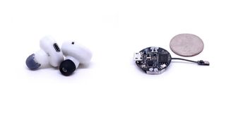 ClearBuds earbuds on a white background; to the right, the mainboard of a single earbud next to an American quarter.