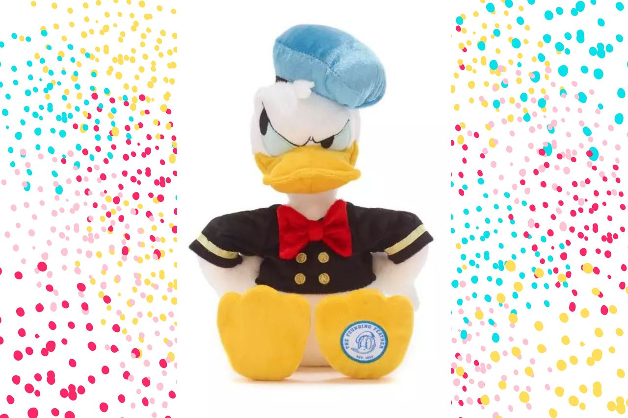 Donald Duck 90th anniversary plush toy with colourful spotty background