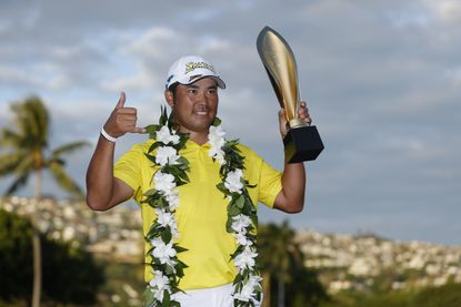 Hideki Matsuyama with the trophy after winning the 2022 Sony Open