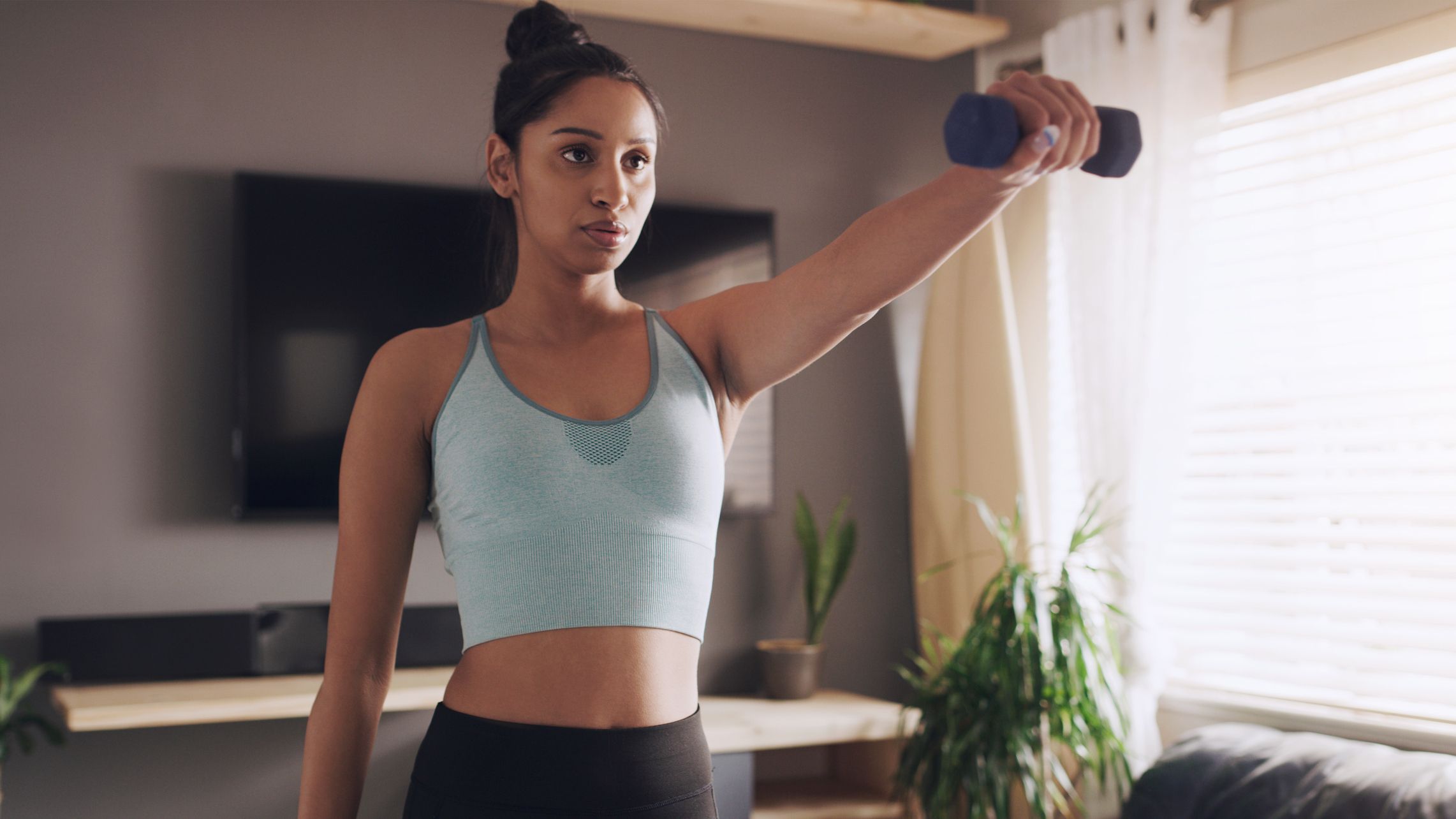 These three dumbbell moves are all you need for strong, toned arms, according to an expert trainer