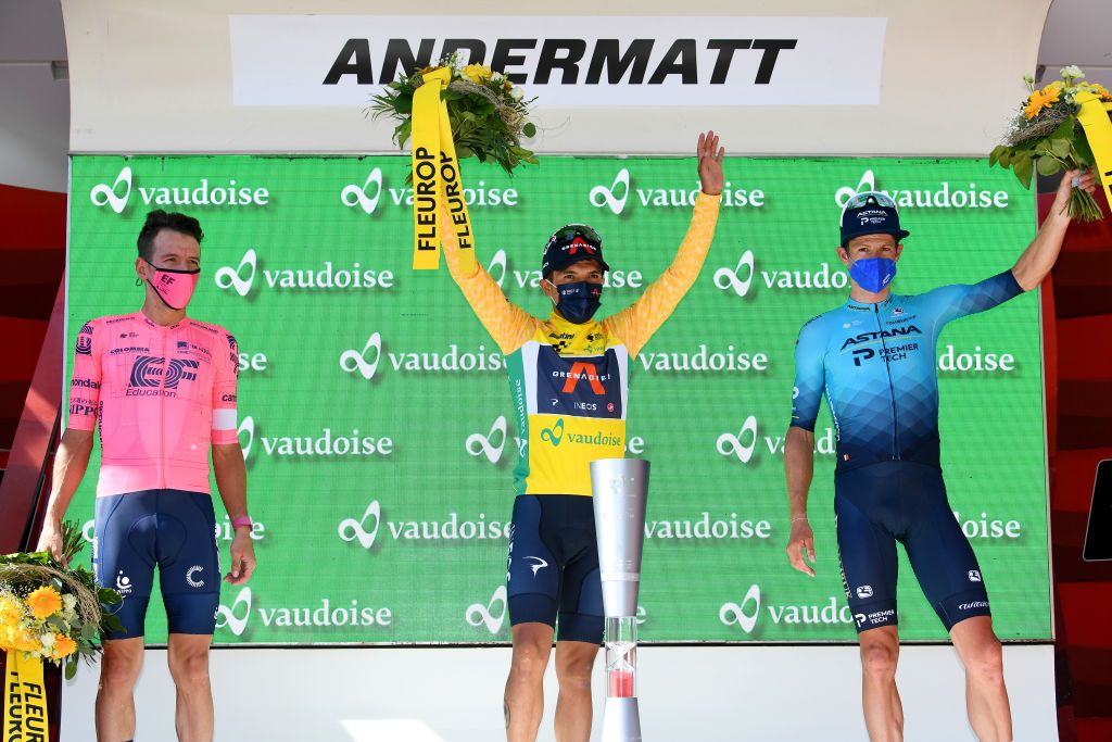 ANDERMATT SWITZERLAND JUNE 13 Rigoberto Uran Uran of Colombia and Team EF Education Nippo 2nd place Richard Carapaz of Ecuador and Team INEOS Grenadiers yellow leader jersey Jakob Fuglsang of Denmark and Team Astana Premier Tech 3rd place celebrates at podium during the 84th Tour de Suisse 2021 Stage 8 a 1595km stage from Andermatt to Andermatt Trophy UCIworldtour tds tourdesuisse on June 13 2021 in Andermatt Switzerland Photo by Tim de WaeleGetty Images