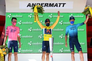 ANDERMATT SWITZERLAND JUNE 13 Rigoberto Uran Uran of Colombia and Team EF Education Nippo 2nd place Richard Carapaz of Ecuador and Team INEOS Grenadiers yellow leader jersey Jakob Fuglsang of Denmark and Team Astana Premier Tech 3rd place celebrates at podium during the 84th Tour de Suisse 2021 Stage 8 a 1595km stage from Andermatt to Andermatt Trophy UCIworldtour tds tourdesuisse on June 13 2021 in Andermatt Switzerland Photo by Tim de WaeleGetty Images