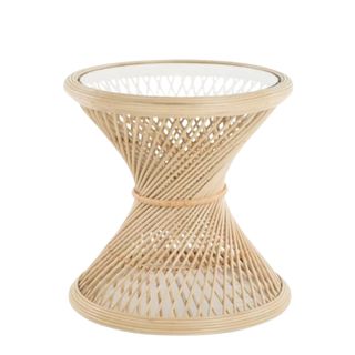 A wooden rattan table in a spiral shape