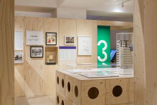 displays against timber backdrop at RIBA's Long Life, Low Energy exhibition
