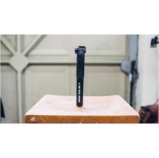A bicycle pump in a garage 