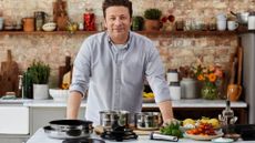 Jamie Oliver using his Tefal Jamie Oliver Ingenio Pan Collection in a kitchen