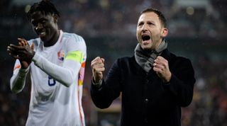 Belgium manager Domenico Tedesco celebrates victory after an international friendly match between Germany and Belgium at RheinEnergieStadion on March 28, 2023 in Cologne, Germany.