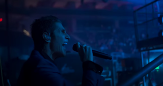 A picture of Perry Farrell performing live