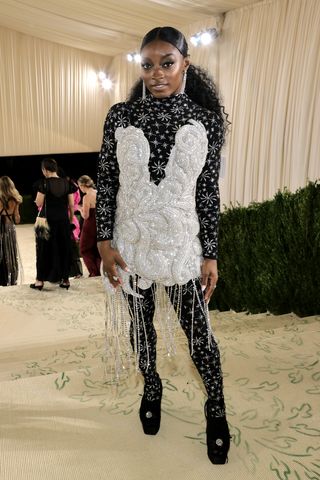 Simone Biles departs The 2021 Met Gala Celebrating In America: A Lexicon Of Fashion at Metropolitan Museum of Art on September 13, 2021 in New York City.