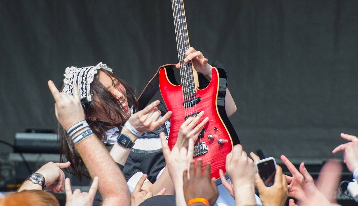 Kanami Tōno performs with Band-Maid at the MCM London Comic Con at The London ExCel on May 28, 2016 in London