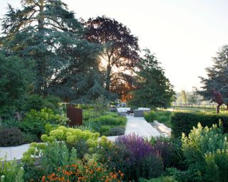 summer garden with A rich tapestry of textured verdant planting