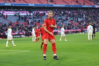 MUNICH, GERMANY - FEBRUARY 01: Harry Kane of Bayern Munich celebrates scoring his team's third goal during the Bundesliga match between FC Bayern München and Holstein Kiel at Allianz Arena on February 01, 2025 in Munich, Germany. (Photo by Alexander Hassenstein/Getty Images)