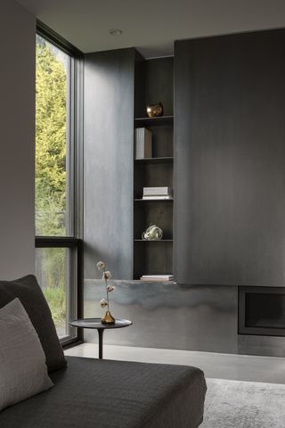 A metal gray cabinet with gray sofa