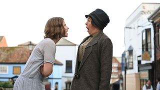 A side view of Rose (Jessie Buckley) shouting at Edith (Olivia Colman) in Wicked Little Letters