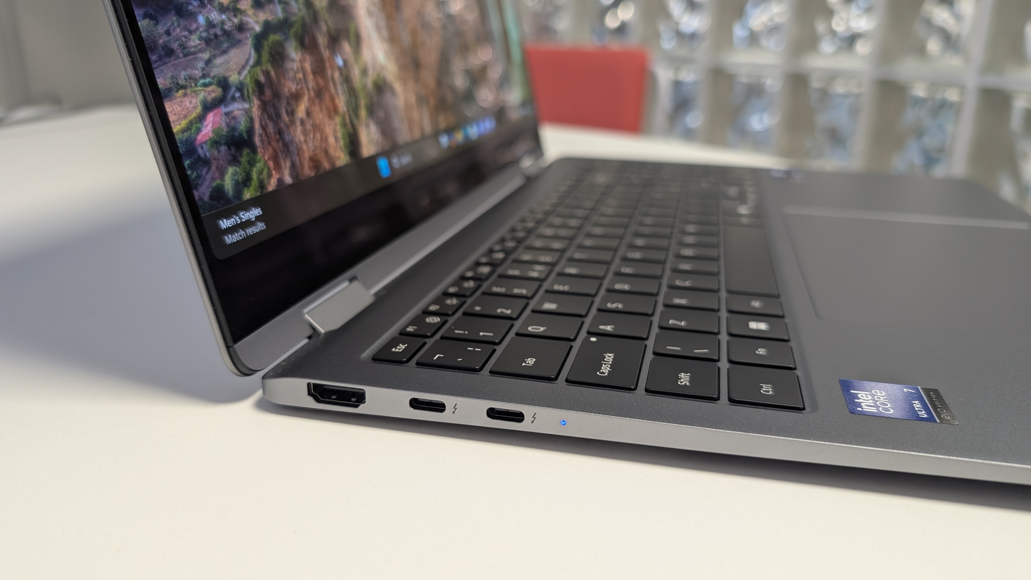 The Samsung Galaxy Book5 Pro 360 photographed on a white desk.