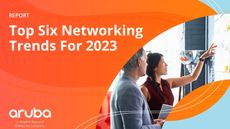 Orange and blue whitepaper cover with two colleagues chatting and looking at a whiteboard