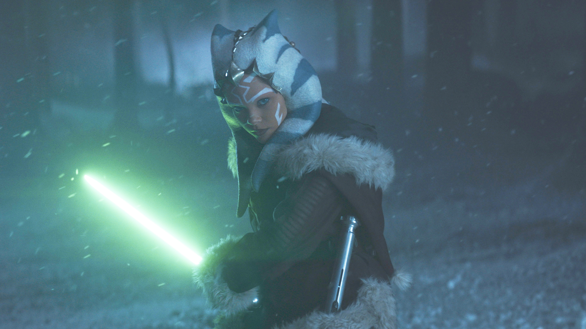 A young Ahsoka Tano with a green lightsaber in Star Wars: Ahsoka season 2