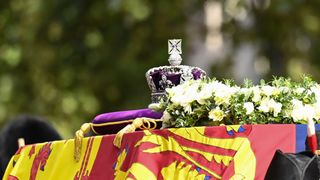 The Queen's imperial state crown sits atop of her coffin as it makes its way to Lie-in-State at Westminster Hall - Queen procession lying-in-state