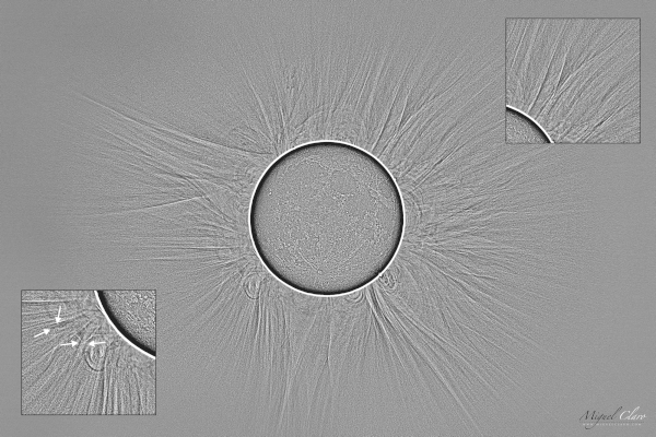 A grey scaled image shows a softly vibrating circle in the center, textured with craters like the moon. Arrays jet out from behind the body. Squares in the lower left and top right show magnified sections of the prominences.