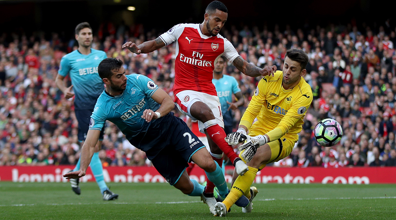 Theo Walcott scores against Swansea