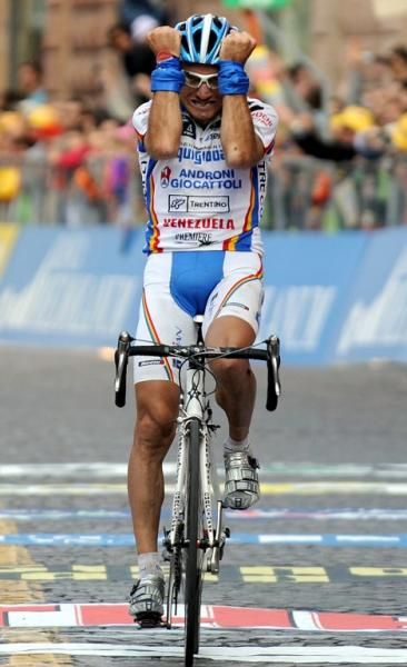 Italy's Alessandro Bertolini shows the emotion involved with winning a stage in one's home Grand Tour.