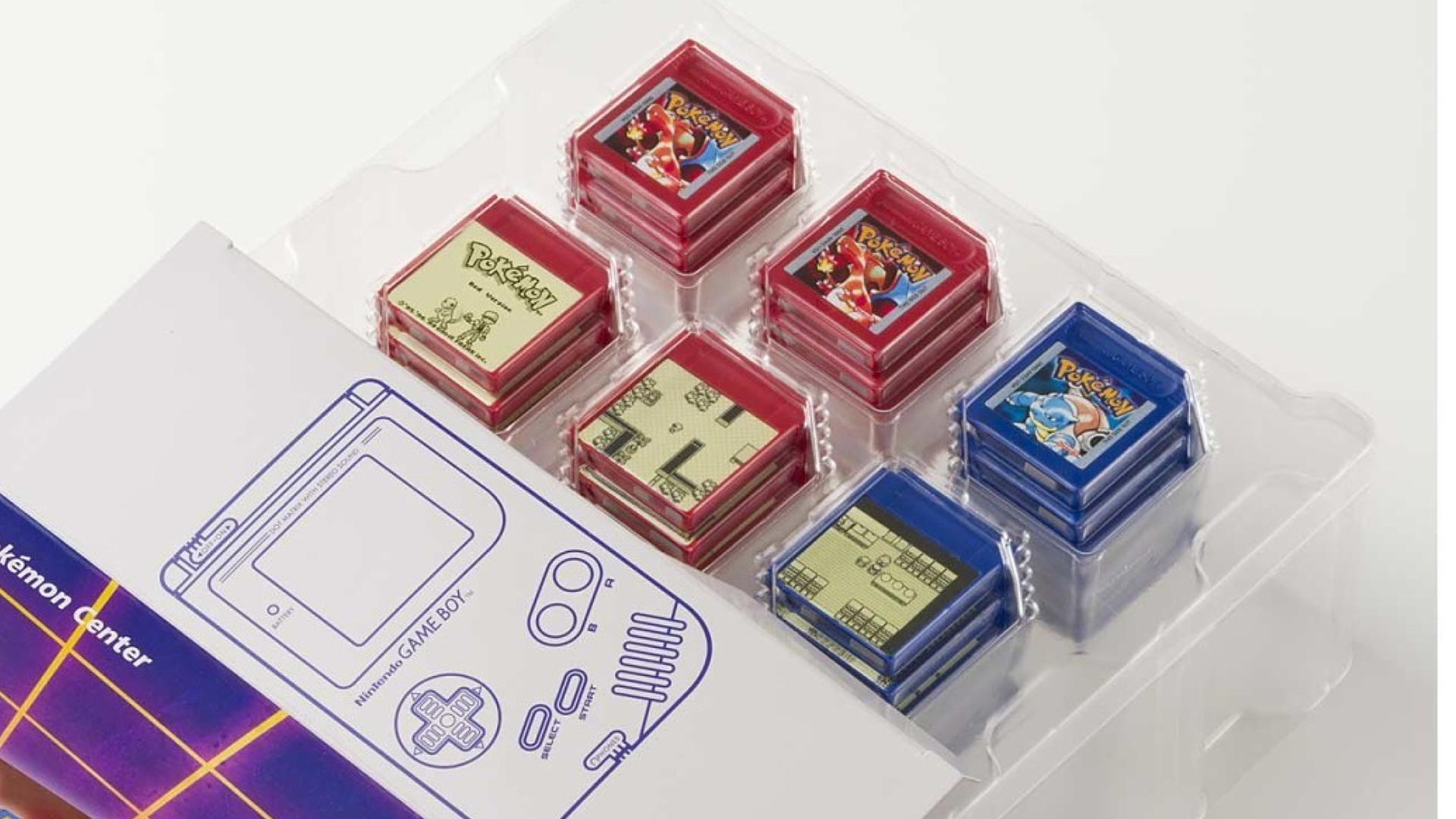 Open Game Boy Juebox box with included cartridges in plastic insert.