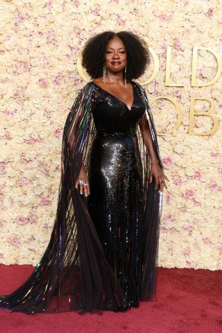 Viola Davis arrives on the 2025 Golden Globes red carpet.