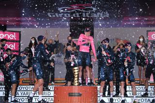 MILANO ITALY OCTOBER 25 Podium Tao Geoghegan Hart of The United Kingdom Jonathan Castroviejo of Spain Rohan Dennis of Australia Filippo Ganna of Italy Jhonnatan Prado Narvaez of Ecuador Salvatore Puccio of Italy Ben Swift of The United Kingdom Team INEOS Grenadiers Trofeo Senza Fine Trophy Celebration Champagne during the 103rd Giro dItalia 2020 Stage 21 a 157km Individual time trial from Cernusco sul Naviglio to Milano ITT girodiitalia Giro on October 25 2020 in Milano Italy Photo by Tim de WaeleGetty Images