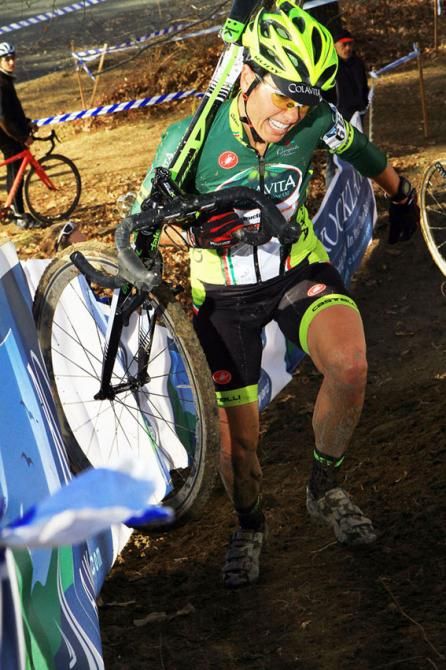Stacey Barbossa (MidAtlantic Colavita Womens Team) climbs against the barriers.