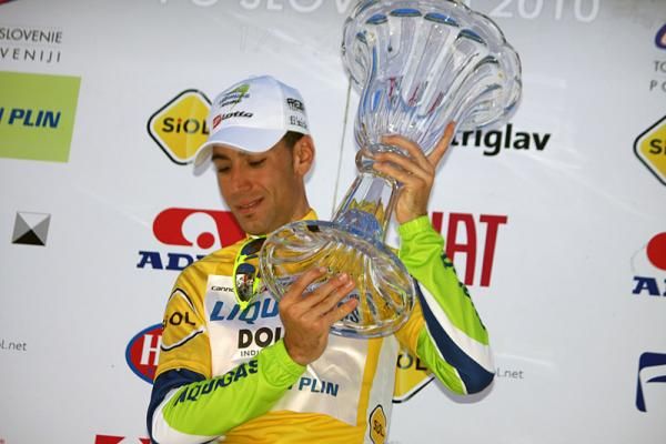 Vincenzo Nibali (LIquigas - Doimo) collects the trophy for his overall victory.